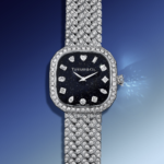 Reloj Eternity by Tiffany en oro blanco 18K con esfera de aventurina cushion, pavé de diamantes y brazalete impecable.